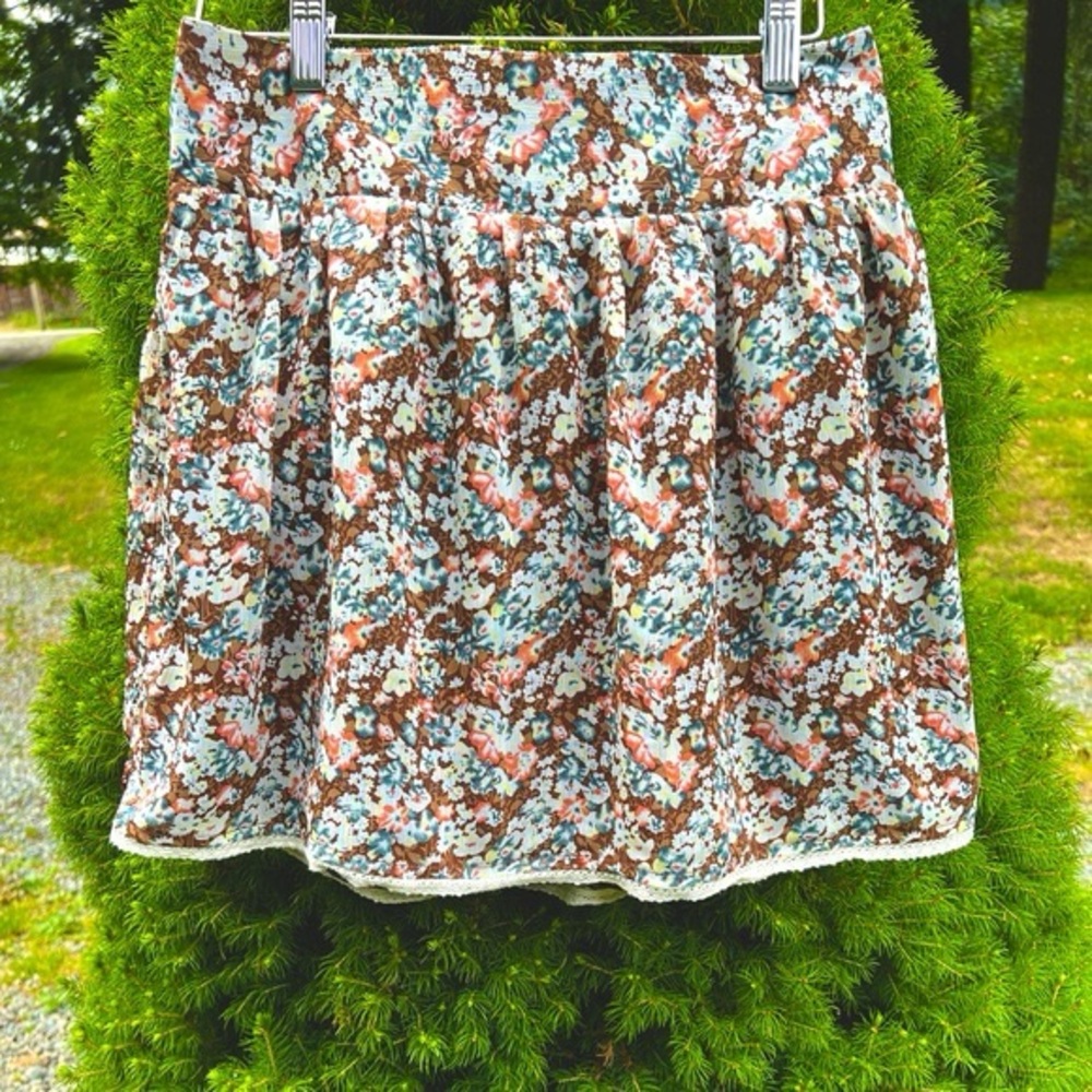 Charlotte Russe Ladies Mini Shirt lined and has elastic back